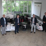 Admiration of the Formula Student racing cars made by a successful start-up in the university incubator